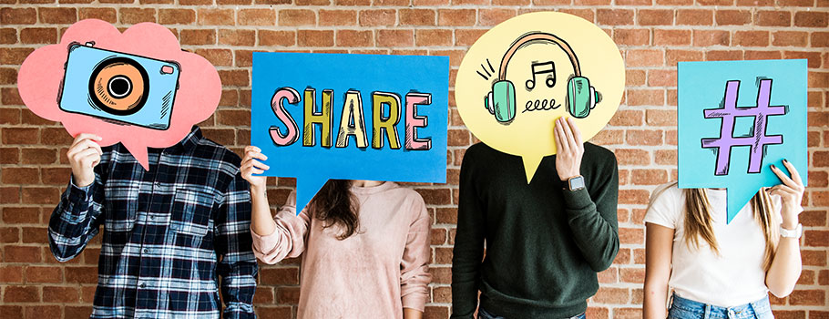 people holding social media icons