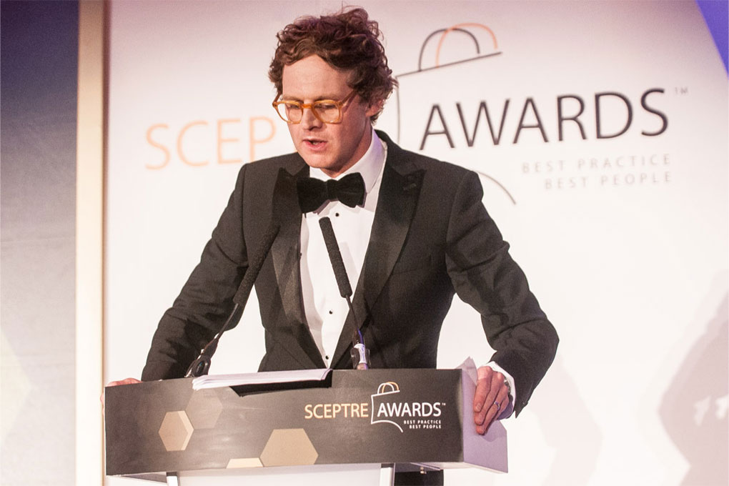 speaker at an award ceremony